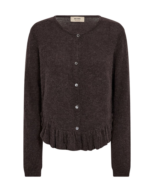 This cardigan i from MOS MOSH is crafted from a soft and lightweight quality with a regular fit that drapes beautifully on the body. The round neckline, delicate button closure, and subtle frill hem add a feminine and elegant touch. Perfect as a light layer over tops and dresses for a romantic everyday look.