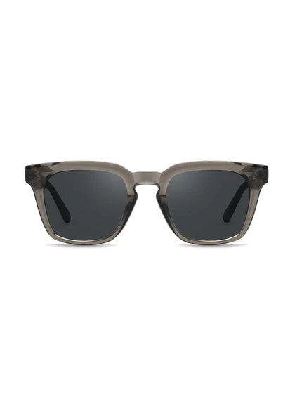 The Martelli Grey sunglasses from ECO SHADES feature a sleek, smoky-gray frame with dark lenses. The frame is slightly oversized, giving a trendy and stylish look. The design is simple and modern, perfect for anyone who wants to look good while making an eco-friendly choice. The name "Martelli" is Italian for "hammers," symbolising strength and durability.