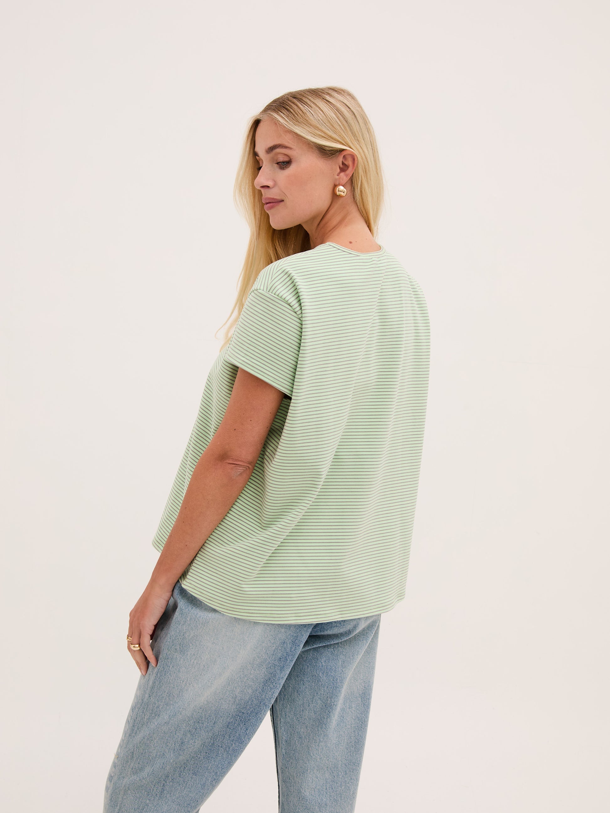 The Mimi cap sleeved T shirt from FIKA is in a buttery soft fabric which feel beautifully soft against the skin. A casual piece to wear with denim all summer or layer under a knit in Winter.