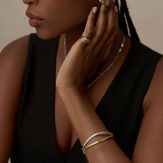 Bring a fresh look to any outfit with this two tone open cuff from ORELIA. Half 925 sterling silver plate and the other 18k Gold plate this is the perfect piece to complete any outfit.