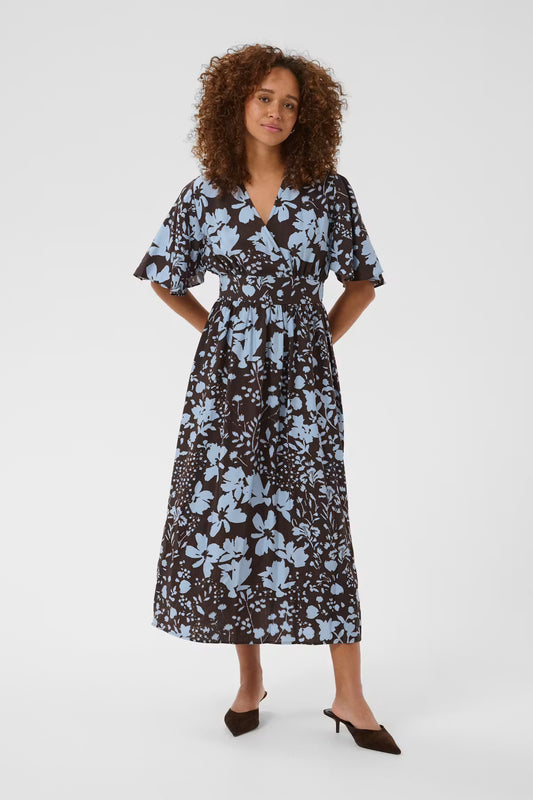 This floral print midi dress from KAFFE features a deep V-neckline, short flutter sleeves, and a fitted waist for a flattering, flowing silhouette. Breezy fabric with a soft texture gives it effortless movement and a distinctively modern look.
