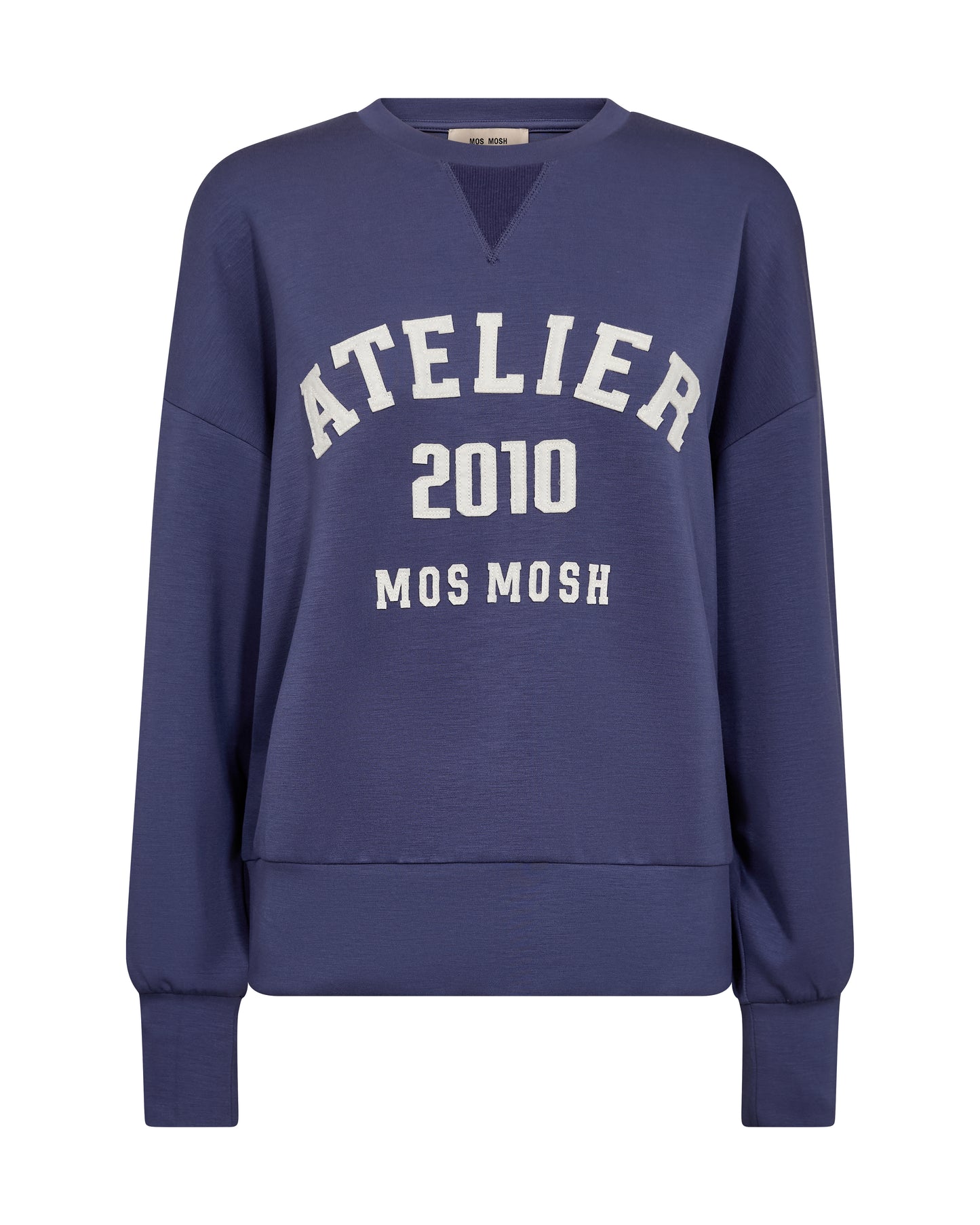 A soft, oversized sweatshirt from MOS MOSH with a casual yet refined look. Designed with a round neckline, ribbed trims, and a bold front print for a sporty edge. The fabric blend feels smooth and comfortable, making it perfect for laid-back days or styled with tailored pieces for a cool contrast.