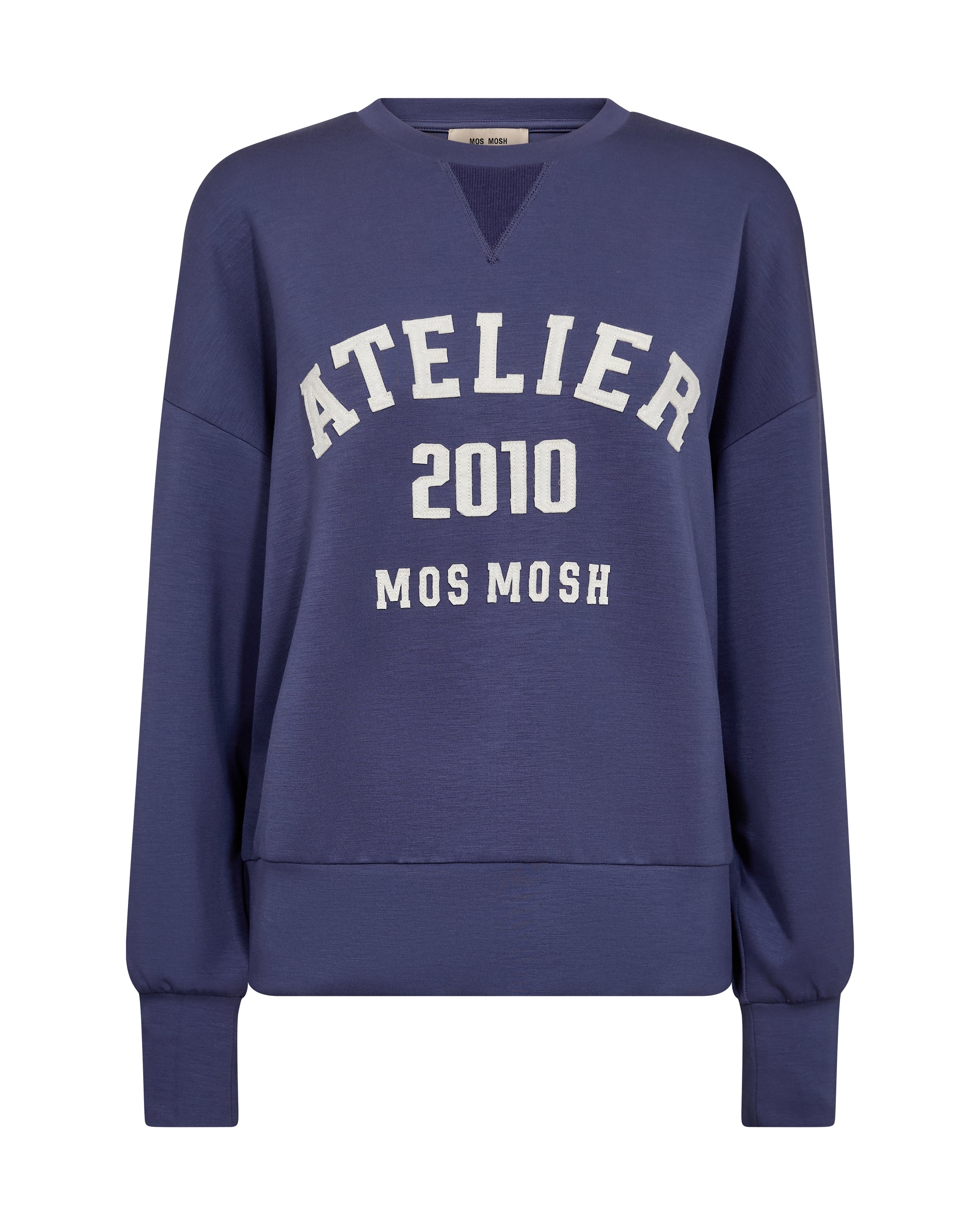 A soft, oversized sweatshirt from MOS MOSH with a casual yet refined look. Designed with a round neckline, ribbed trims, and a bold front print for a sporty edge. The fabric blend feels smooth and comfortable, making it perfect for laid-back days or styled with tailored pieces for a cool contrast.