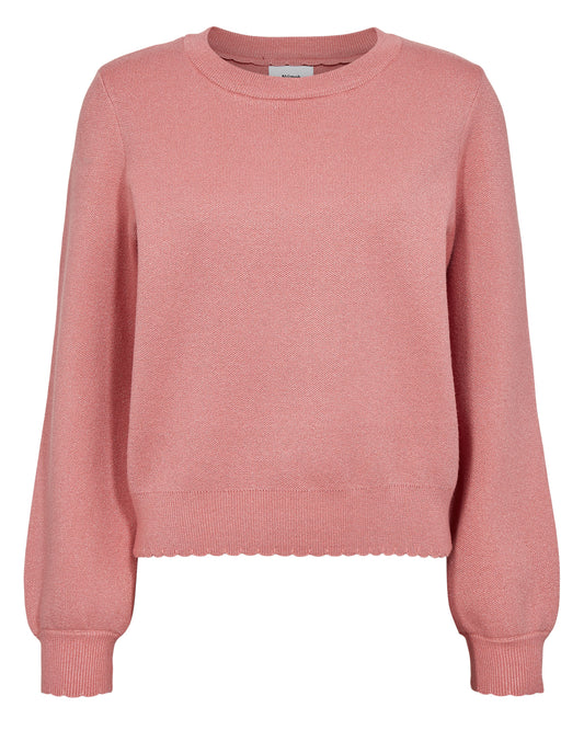 This pretty pink knit from Scandi brand NUMPH is a great piece for everyday and also day to night. With an added delicate sparkle although subtle it has that luxurious feel. With a simple round neck and long sleeves with a ribbed and scalloped cuff. The shape is slightly boxy and the fit is true to size.