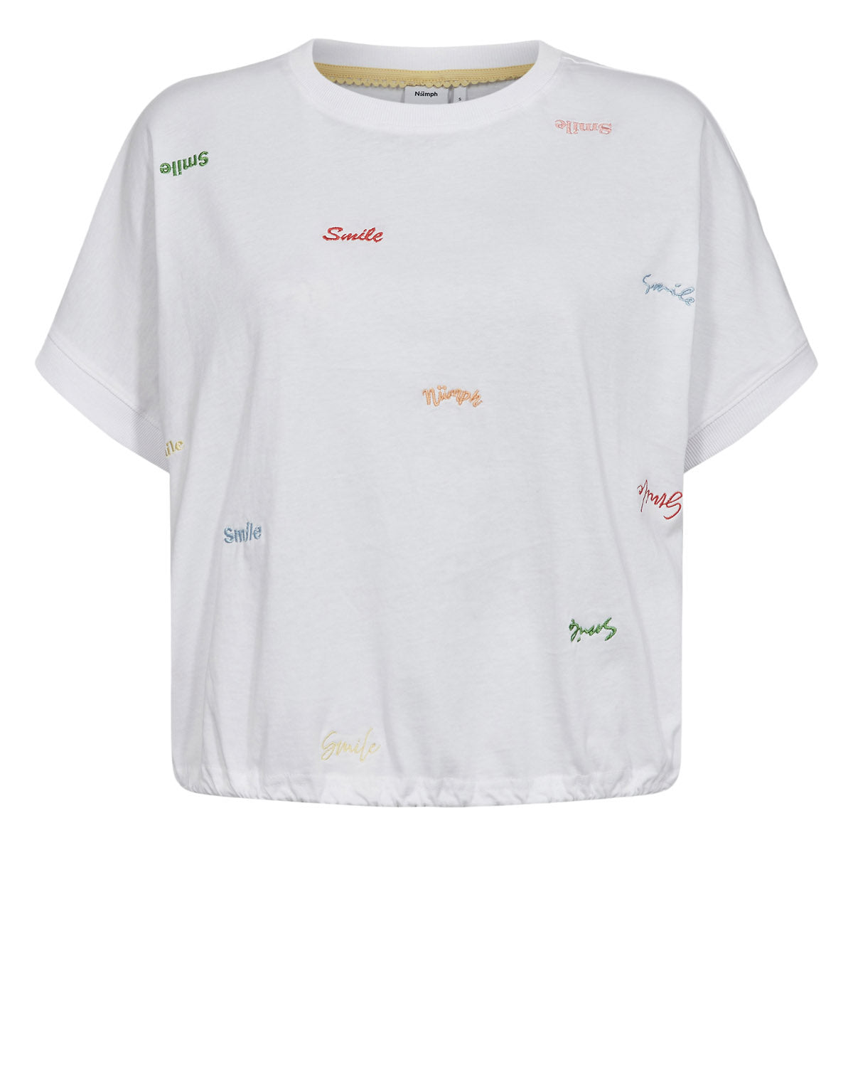 A simple yet stylish T shirt from NUMPH in a boxy fit. A white background with multi coloured embroidered "smile" throughout. The drop shoulder means the short sleeve is a good length and the straight hem has a toggle to pull the fit in at the hem.