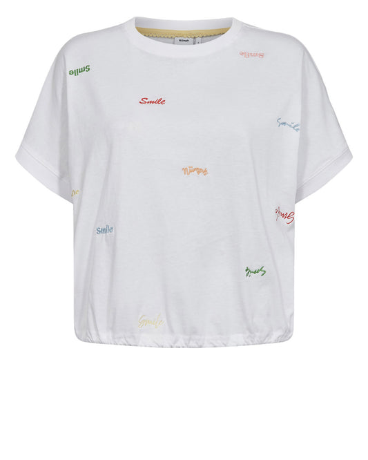 A simple yet stylish T shirt from NUMPH in a boxy fit. A white background with multi coloured embroidered "smile" throughout. The drop shoulder means the short sleeve is a good length and the straight hem has a toggle to pull the fit in at the hem.