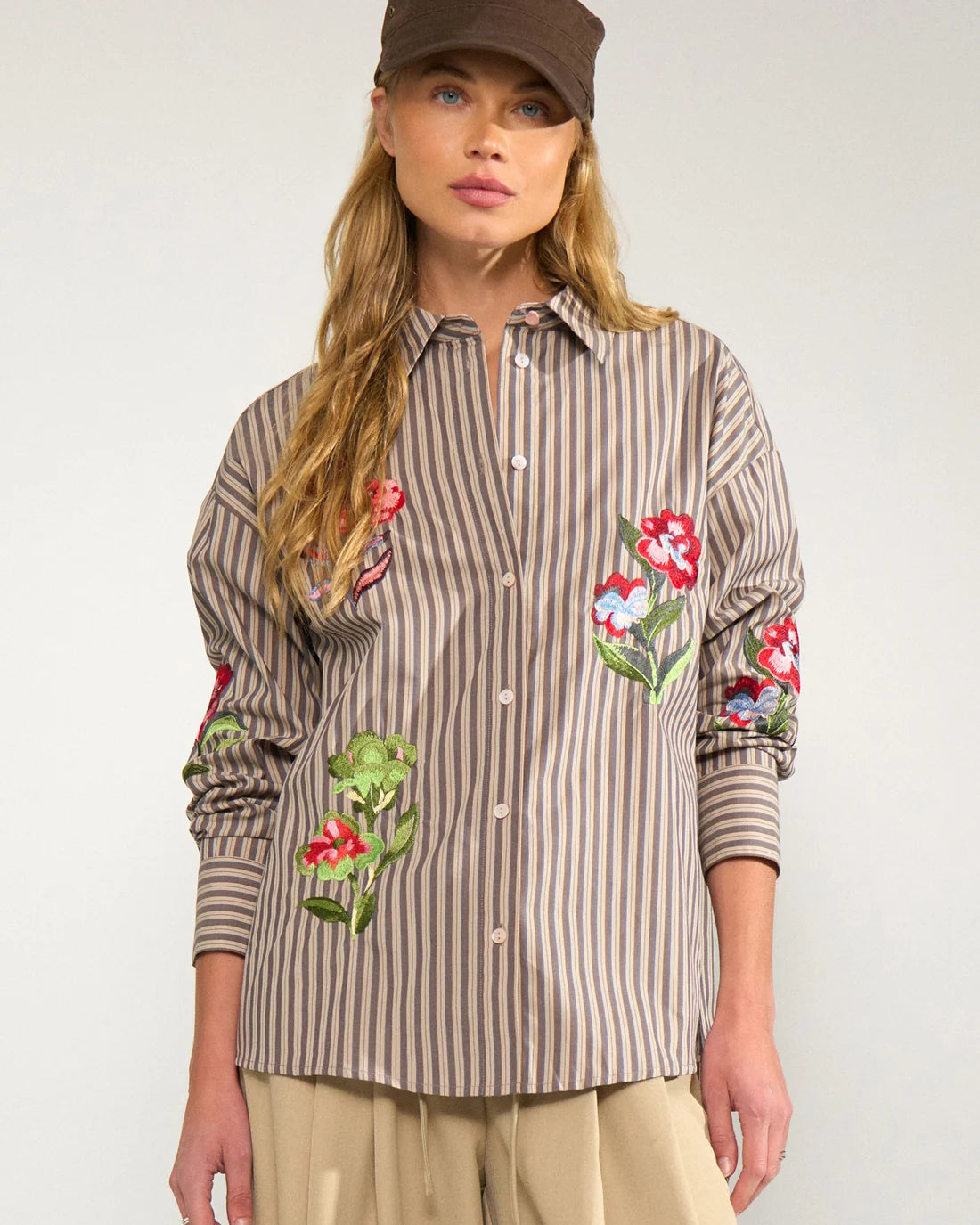 Numph's Nukacey Embroidery Shirt combines a classic tailored shirt with feminine detailing to make it wearable from work to weekend. This striped cotton shirt boasts vibrant floral embroidery upon the front and sleeves that bring real personality to your wardrobe. Pair with everything from jeans to wide leg trousers.