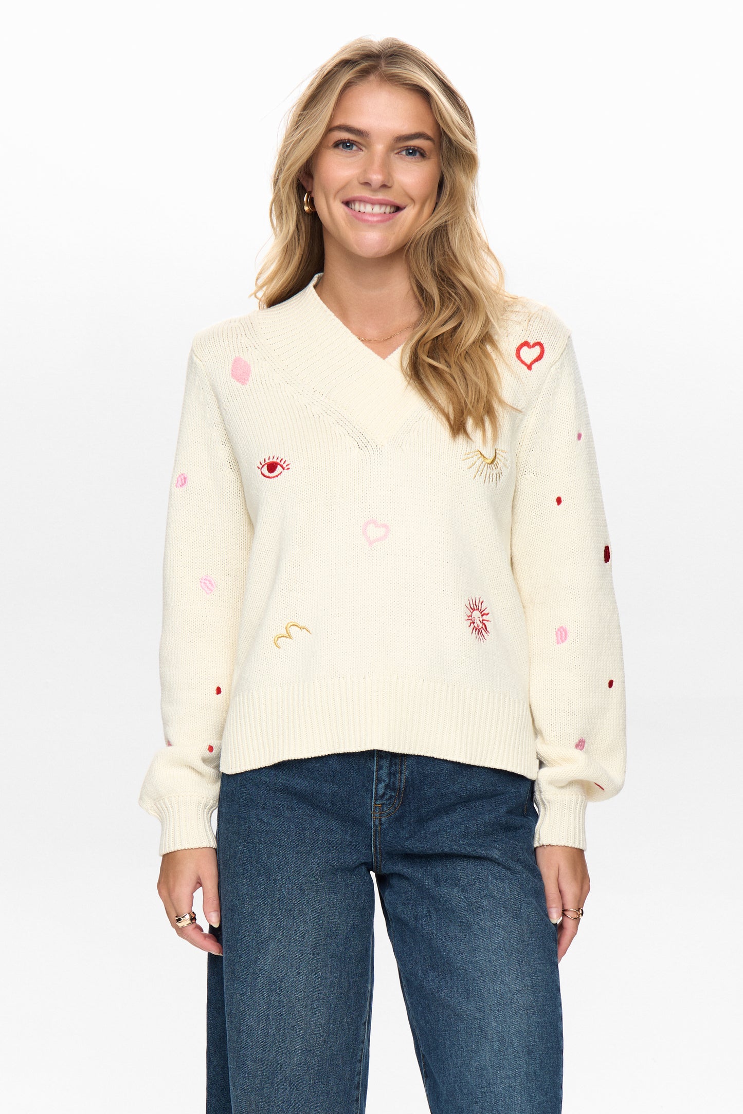 This statement knit from Scandi brand NUMPH is a stunner. A neutral piece that will work hard in any Spring wardrobe. With colourful yet random embroidery front and back it is a ClobR favourite for sure. Wear oversized with denim . There is a ribbed hem with small side splits. Fits true to size.
