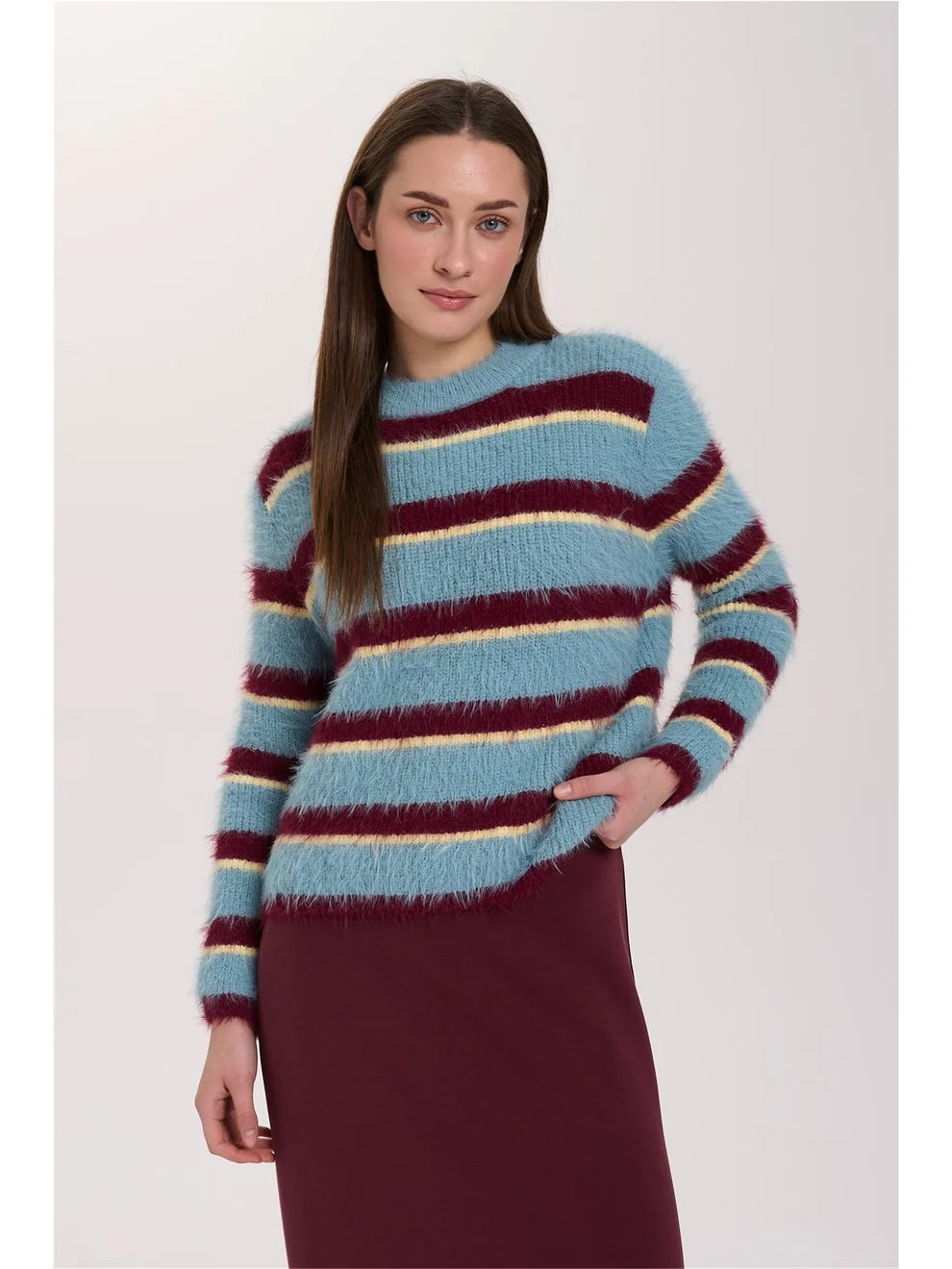 A relaxed-fit knitted jumper with a soft, fluffy texture and horizontal stripes in light blue, burgundy and cream. The classic crew neckline, dropped shoulders and long sleeves create a comfortable, relaxed fit.