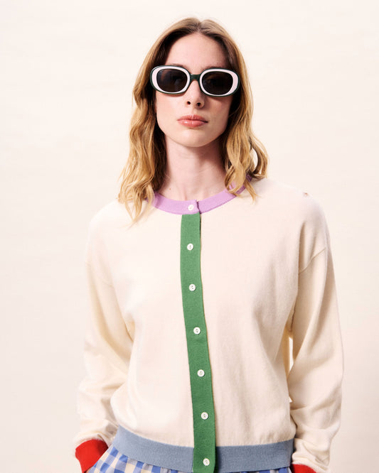 A quirky light weight cardigan with colour block details and central button fastening from Parisian brand FRNCH. This great piece is neutral but with accents of bright colours on the cuffs, hem and placket. The fit is true to size .