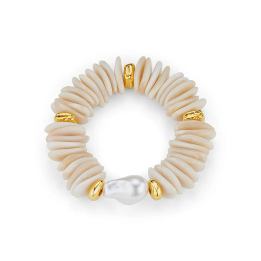 For those who love the beach, the Statement Chip & Stationed Pearl Bracelet from ORELIA is perfect for layering or wearing alone. A must-have accessory every summer, for anyone who appreciates bold style. This unique piece combines shell inspired chip accents, separated with gold plated beads, finished with a timeless stationed pearl. A captivating contrast that elevates any look.