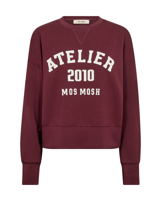 A soft, oversized sweatshirt from MOS MOSH with a casual yet refined look. Designed with a round neckline, ribbed trims, and a bold front print for a sporty edge. The fabric blend feels smooth and comfortable, making it perfect for laid-back days or styled with tailored pieces for a cool contrast.