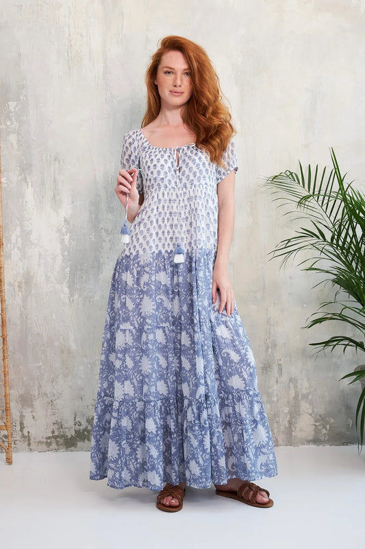 This beautiful Summer dress from French brand CHICO SOLEIL is a great all rounded. Wear as a day dress with sandals or a trainer or dress up with a heel for an Occasion. Longer in length this maxi dress is scooped at the neck and elasticated with short semi sheer sleeves. Loose in fit and tiered on the skirt this piece will keep you cool and fresh.