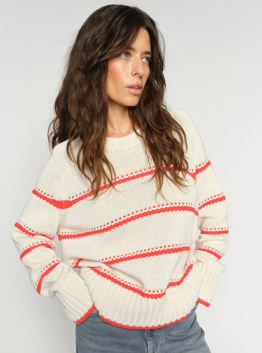 A timeless striped knit from MOS MOSH you can wear again and again. Crafted from soft organic cotton in a regular fit, featuring a classic crew neckline and ribbed trims. The contrast stripes add a fresh, nautical-inspired touch. Perfect for pairing with jeans or layered over tailored pants for a chic everyday look.