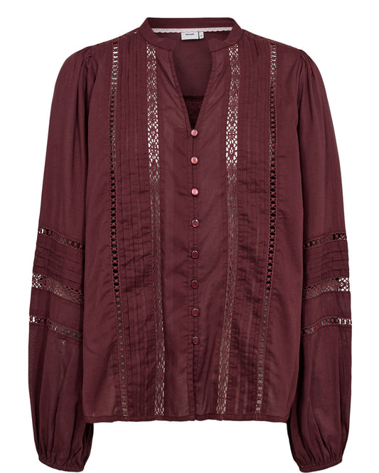  NUSanna shirt which has a notch neck , cut out detailing at the front long sleeves with elasticated cuff and cut out detail on the sleeve too 