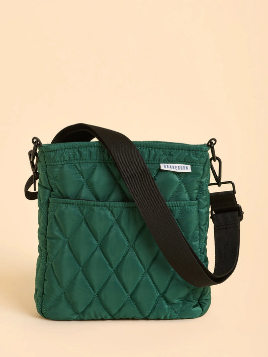 Compact and practical bag from BRAKEBURN with a seasonal twist, the Shipstal Cross Body comes in quilted emerald green with rope zip pulls and matte black hardware. With a popper pocket at the back and handy compartments inside, it’s finished with a top handle and adjustable strap for easy everyday wear.