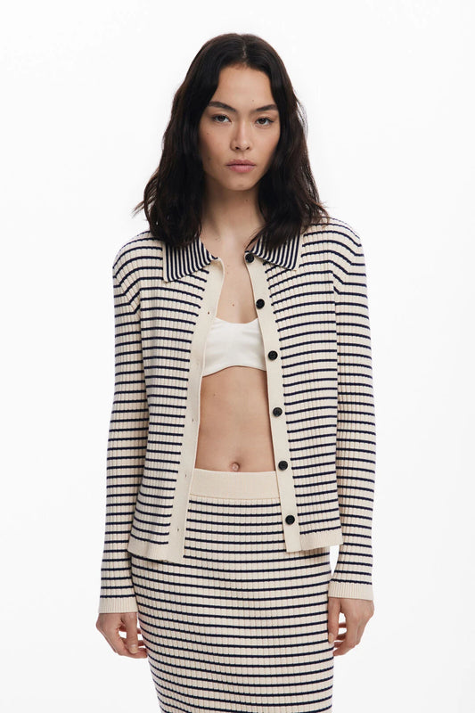 Fitted cardigan-style sweater from Spanish brand DESIGUAL with front buttons, polo-style collar, and horizontal stripe pattern. The fit is very neat