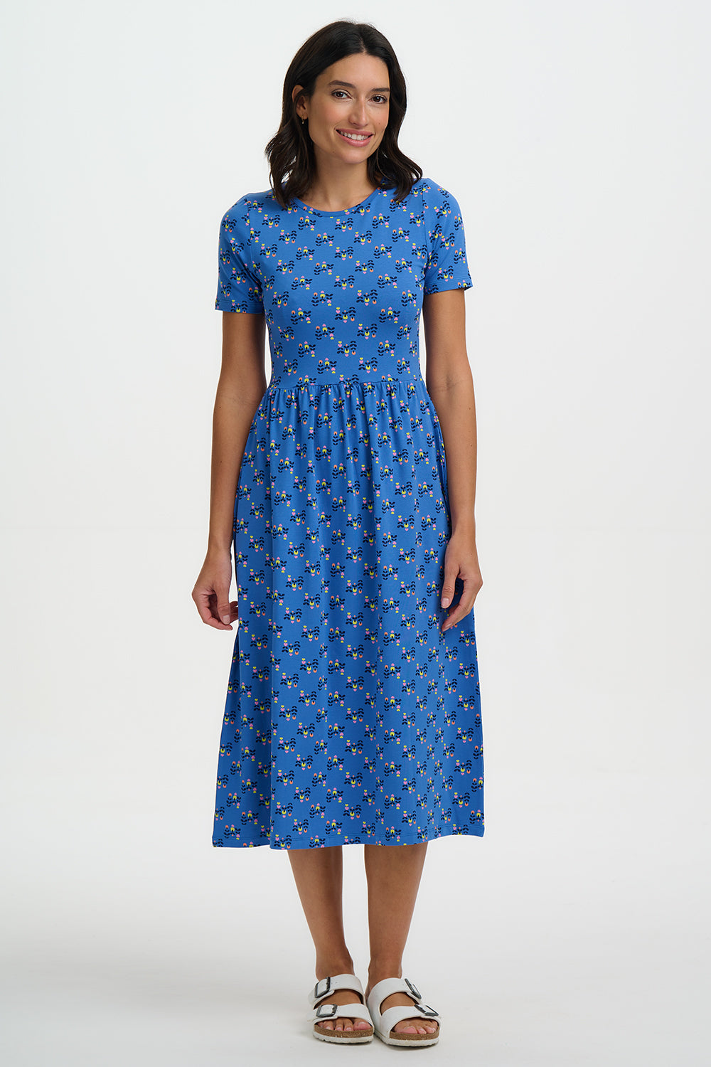 The perfect day dress for Spring from British brand SUGARHILL Brighton. A midi length piece with short sleeves and a round neck. There are side seam pockets and the fit is true to size.