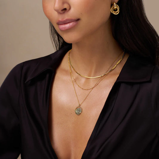 ORELIA "Medallion Spinner Necklace" (Pale Gold)