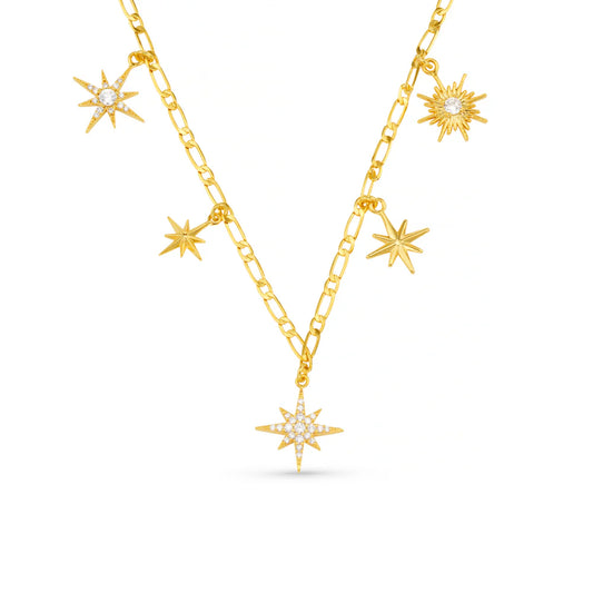 Elevate your evening attire with the Statement Starburst Charm Drop Necklace. Featuring crystal starburst charms, no two the same, along a refined long chain. This elegant piece captures the light with subtle sophistication.