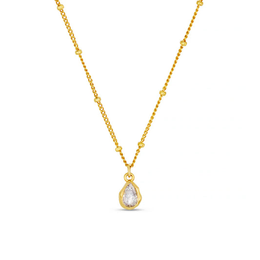 Shine all year long in the Organic Crystal Teardrop Necklace.
Featuring a satellite gold chain with gorgeous teardrop pendant.