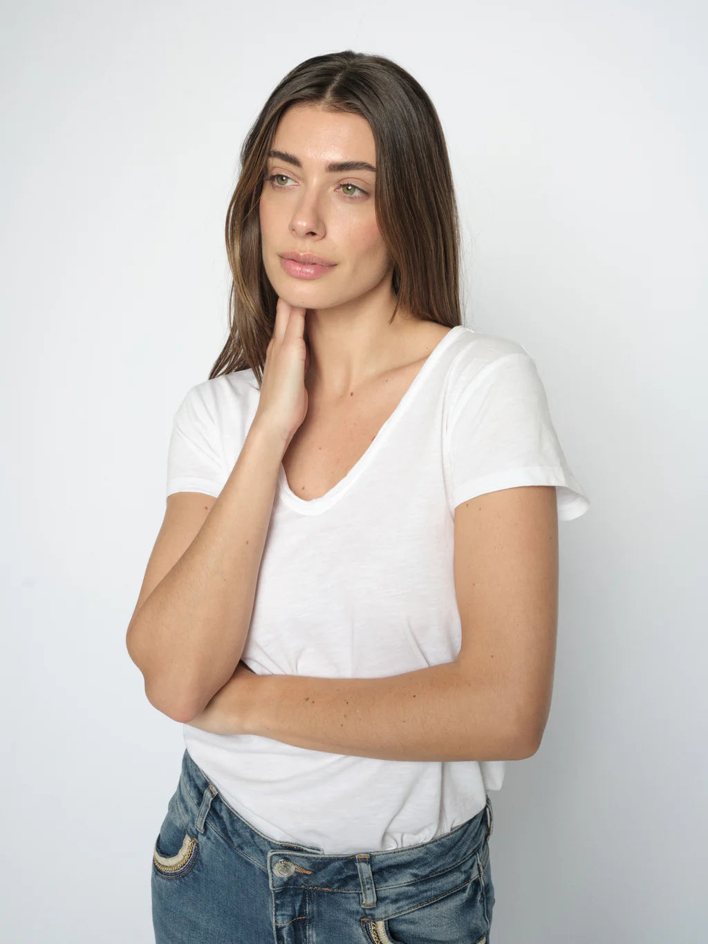 A timeless wardrobe staple from MOS MOSH, this fitted V-neck T-shirt is crafted from soft organic cotton for everyday comfort. Designed with short sleeves and a flattering silhouette, it’s perfect for layering or wearing on its own. A versatile essential that pairs effortlessly with everything from denim to tailored pieces.