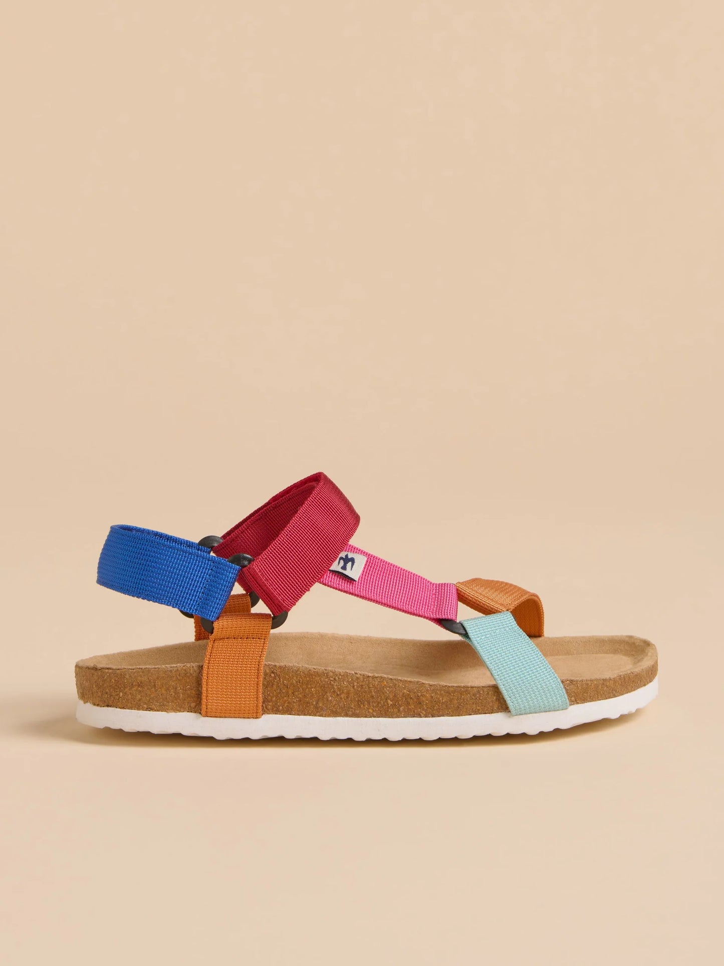 Celebrate your love of colour in the Playful Webbing Strap Sandal from BRAKEBURN. With a moulded sole, wide straps, and easy Velcro fastening, these shoes were made for walking as well as wowing. Add a pop of colour to any outfit all summer long with these easy to wear favourites.