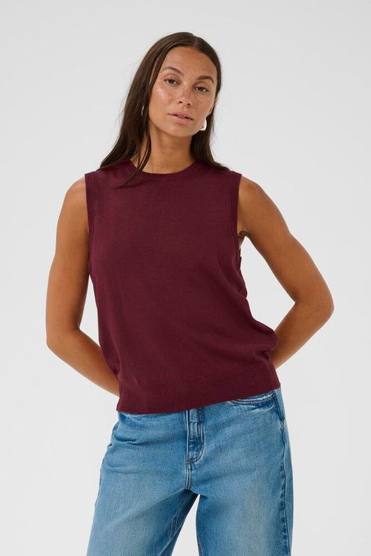 A great little slip from Scandi brand KAFFE in the softest of knits. This simple wardrobe staple will work hard in any capsule wardrobe. Wear as it is or over a crisp white shirt with denim. Round in the neck and sleeveless this is a great layering piece.