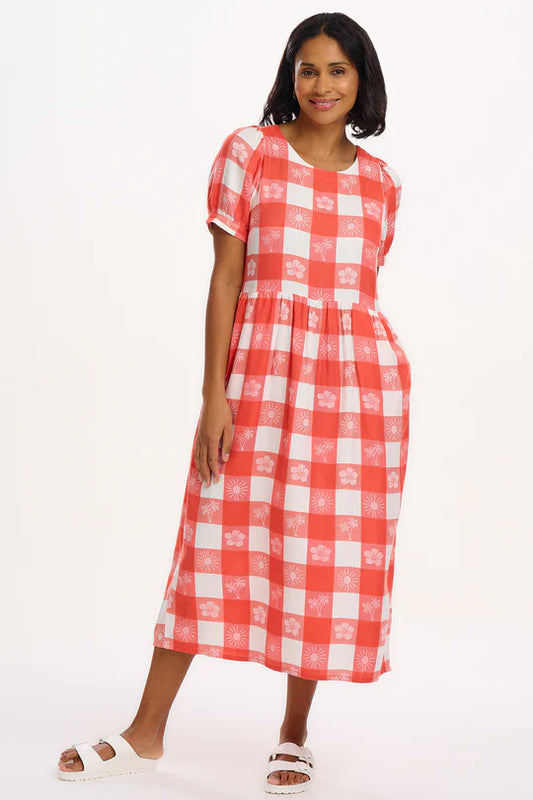 This style from SUGARHILL mirrors the Lizzy Smock, boasting a flattering midi length and crafted from a unique Sugarhill yarn-dyed fabric. It showcases our fresh Tropical Gingham pattern, featuring delightful shades of coral and off-white.